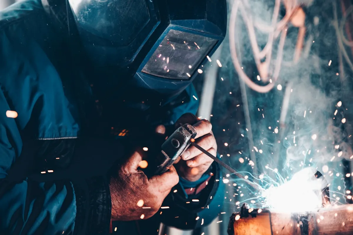 Construction worker using mobile app in basement with no signal
