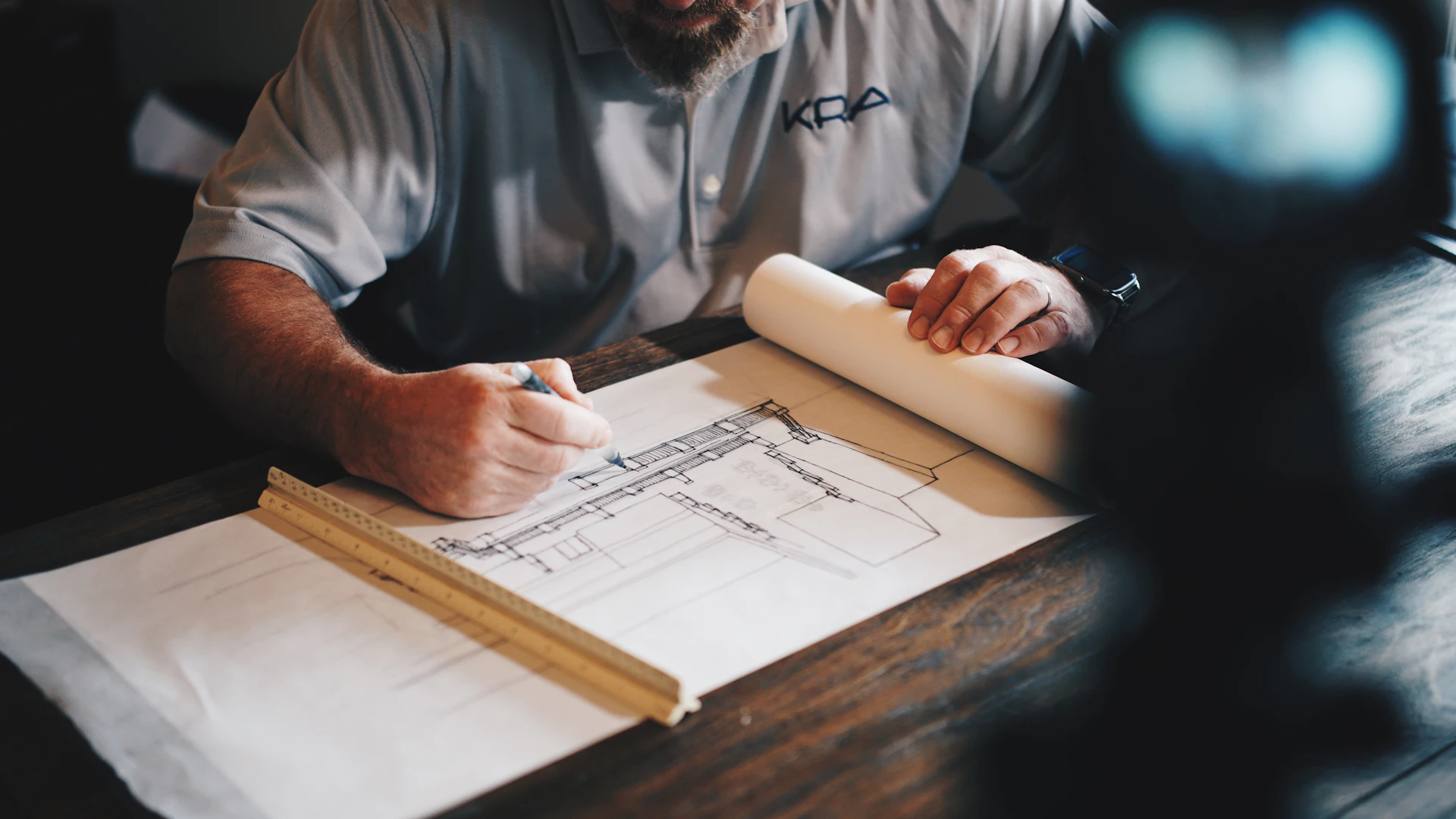 Construction blueprints on a site table